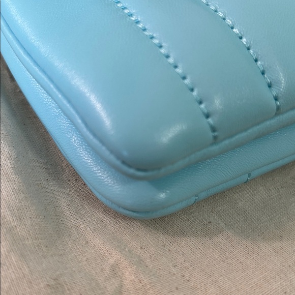 Used Tory Burch Mini Kira Top Handle bag in Light Celeste. - Picture 5 of 15